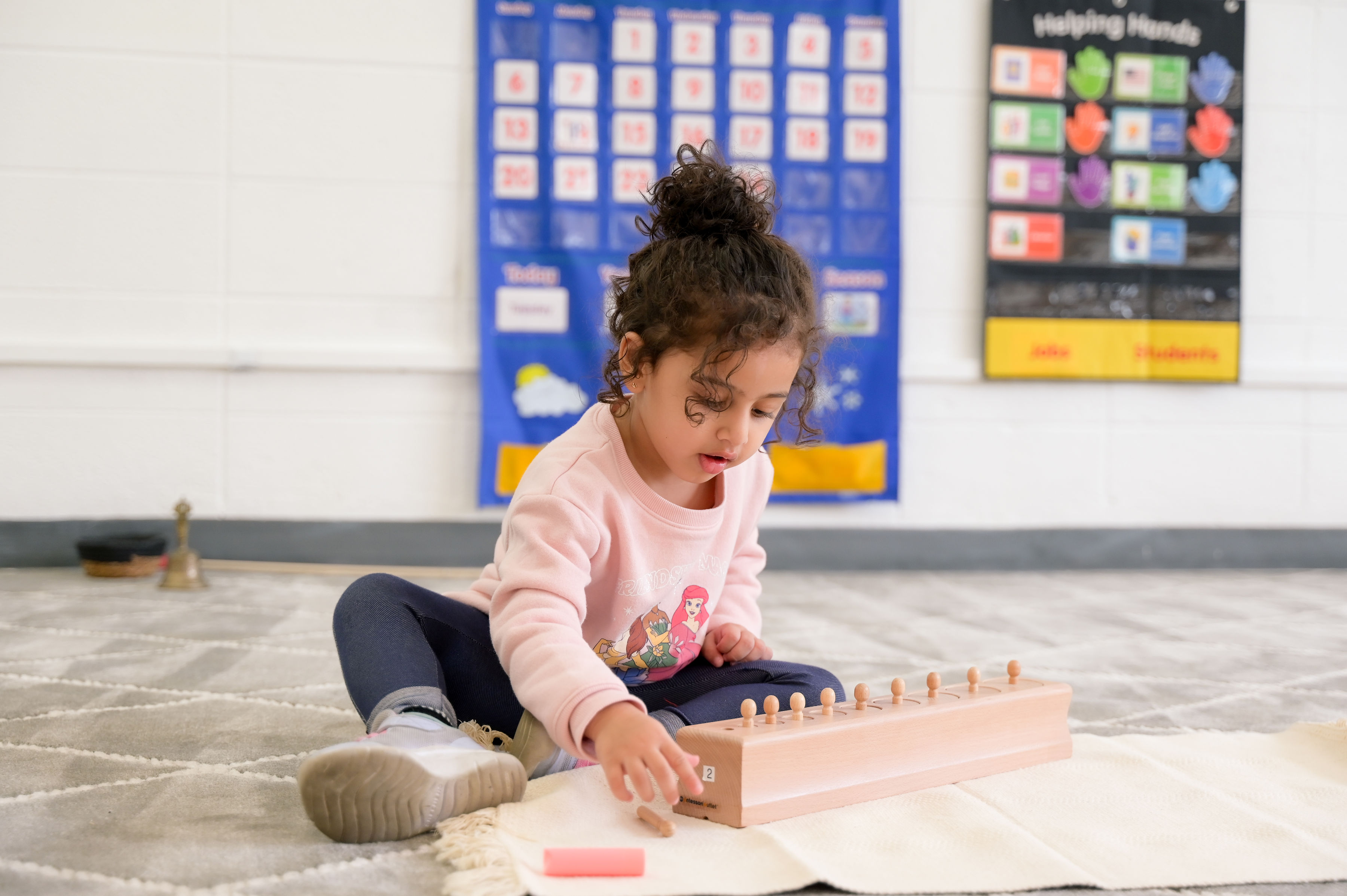 Child working with pattern learning materials